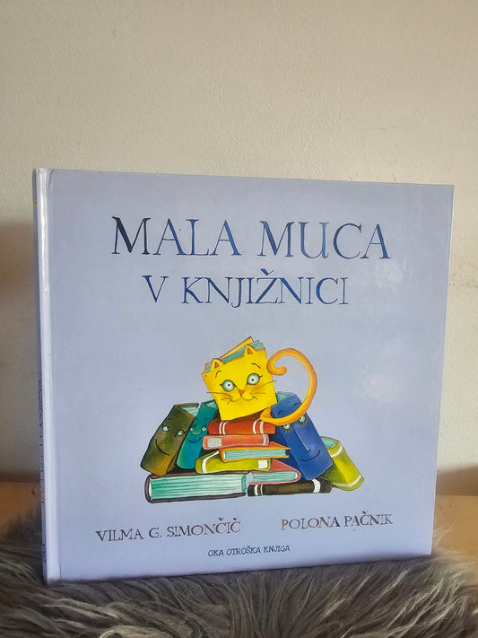 Mala muca v knjižnici, Vilma G. Simončič