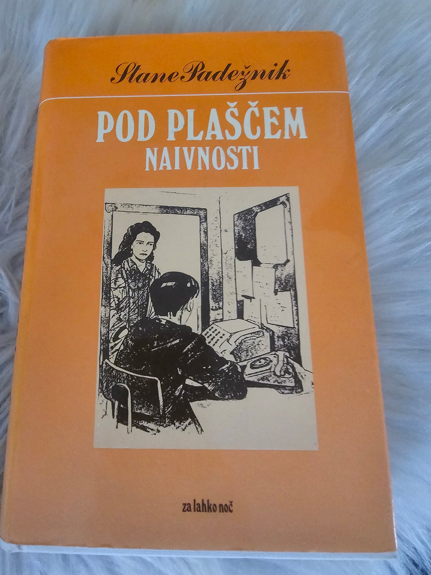 Pod plaščem naivnosti  Stane Padežnik
