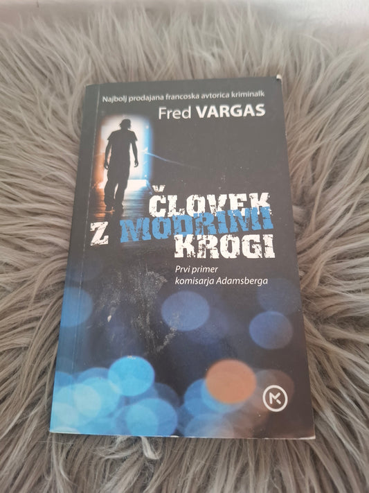 Človek z modrimi krogi Fred Vergas