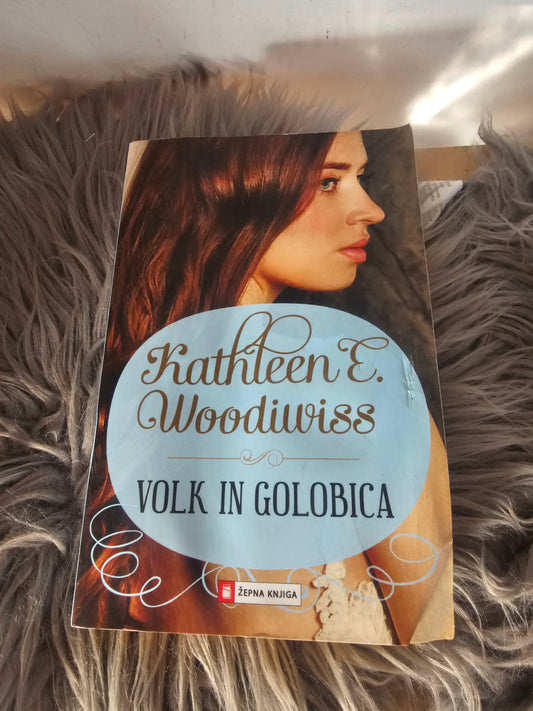 Volk in golobica Kathleen E. Woodiwiss