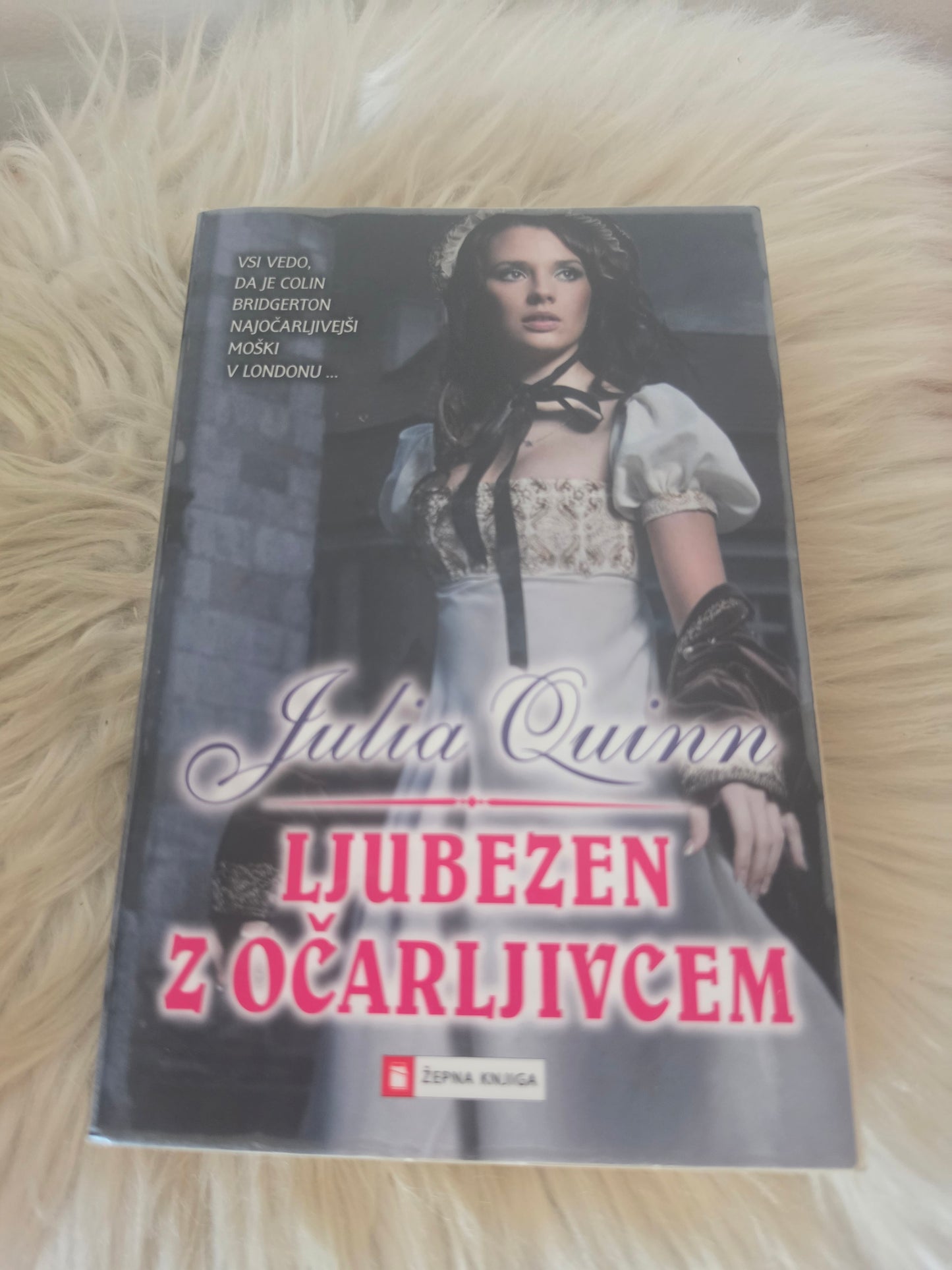 Ljubezen z očarljivcem Julia Quinn