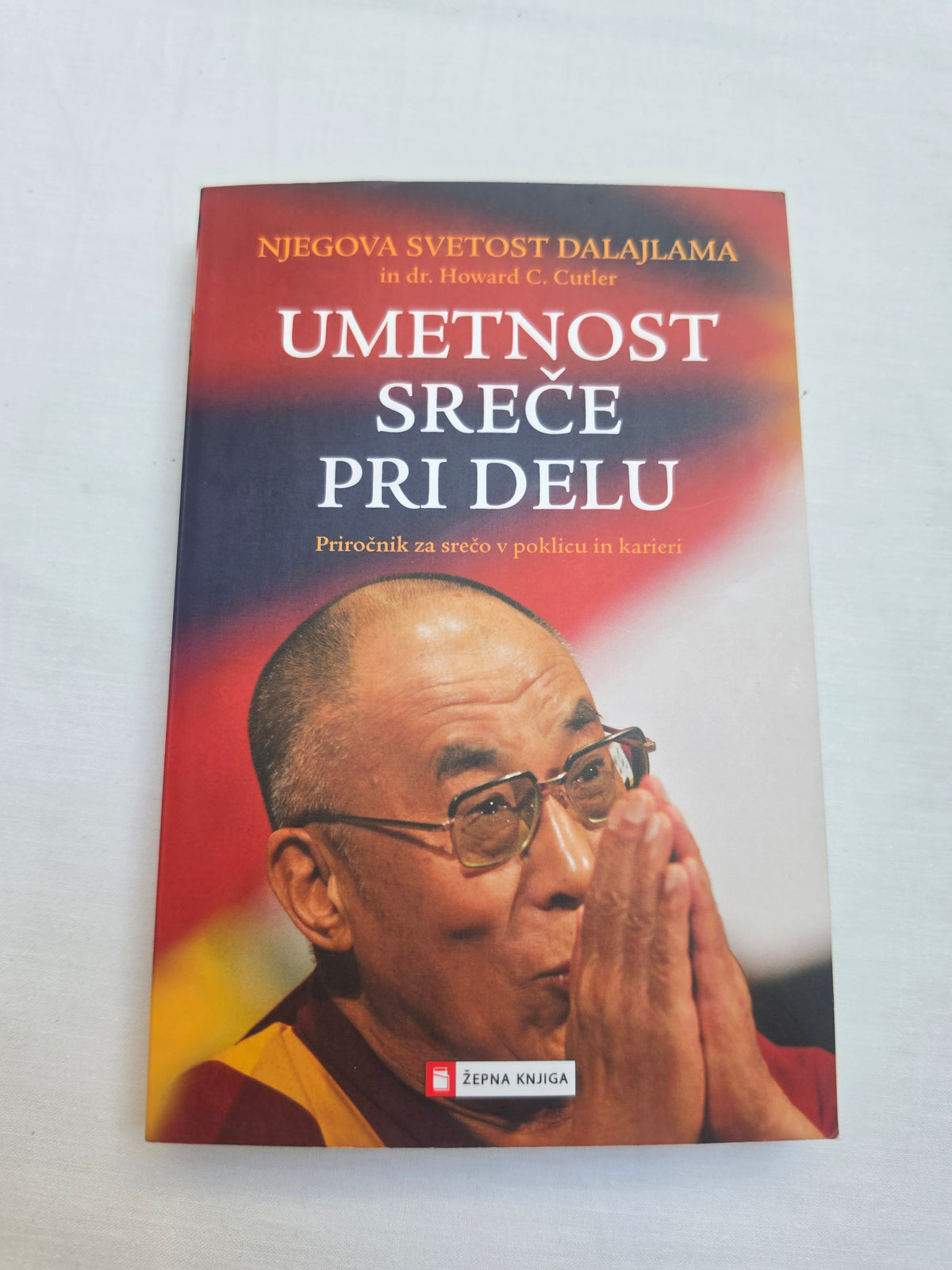 Umetnost sreče pri delu Njegova svetlost Dalajlama in dr. Howard C. Cutler