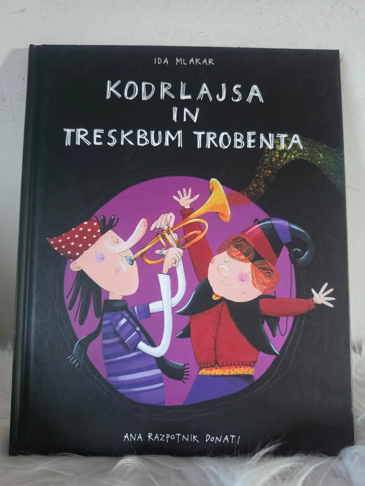 Kodrlajsa in treskbum trobenta, Ida Mlakar